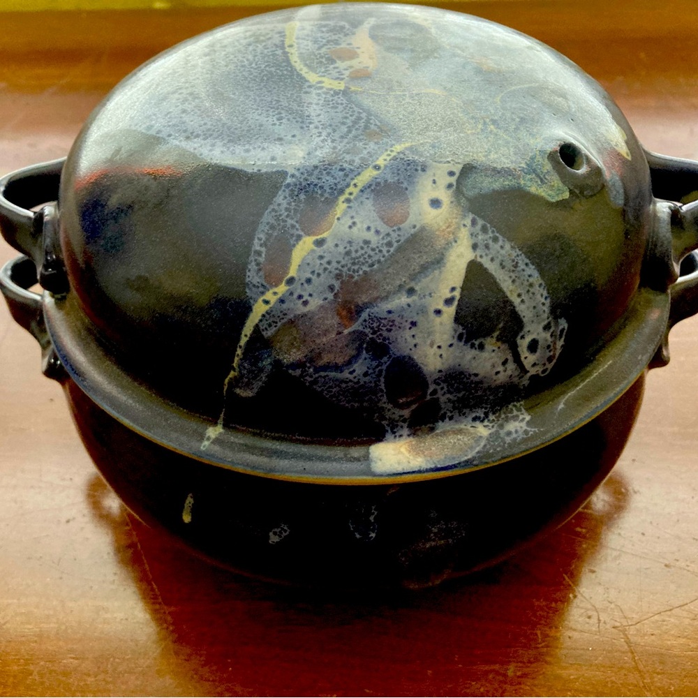 Pottery serving dish with the lid!  unique dish, which makes a great gift!